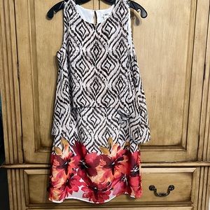 Flimsical dress with flowers and print.